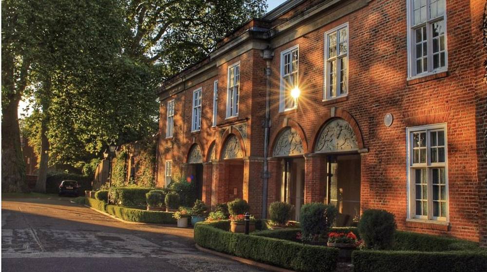 Hitchin Priory in evening sunlight